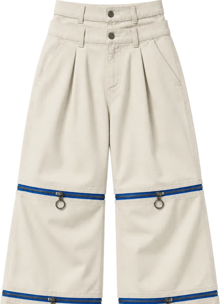 Double-Waist Pleated Wide Trouser, cropped length with the lower legs zipped off, laid flat